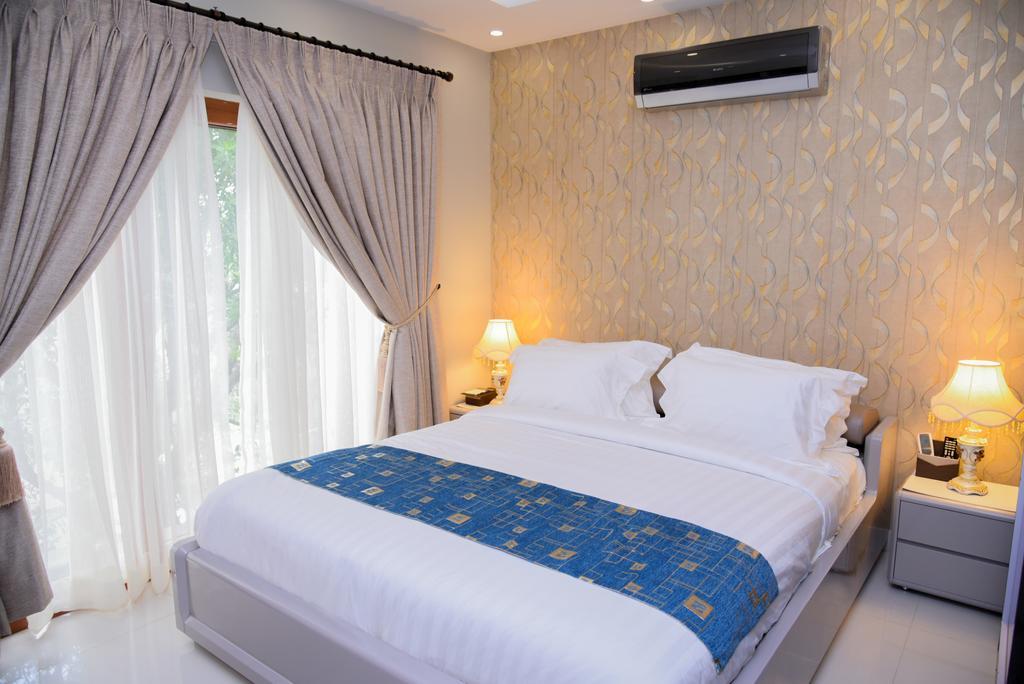 Orchards Cottage Hotel Karachi Exteriör bild