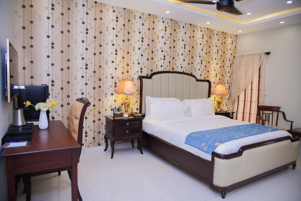 Orchards Cottage Hotel Karachi Exteriör bild
